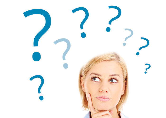 woman questioning hypnosis with question marks floating around her